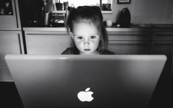 Child on a computer using technology